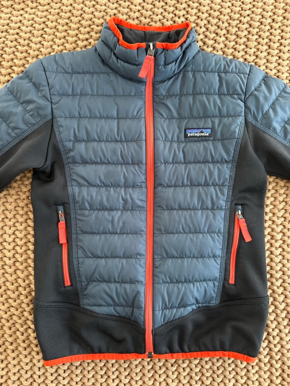 Patagonia Quilted Blue and Black Jacket with Orange Trim - Picture 2 of 5